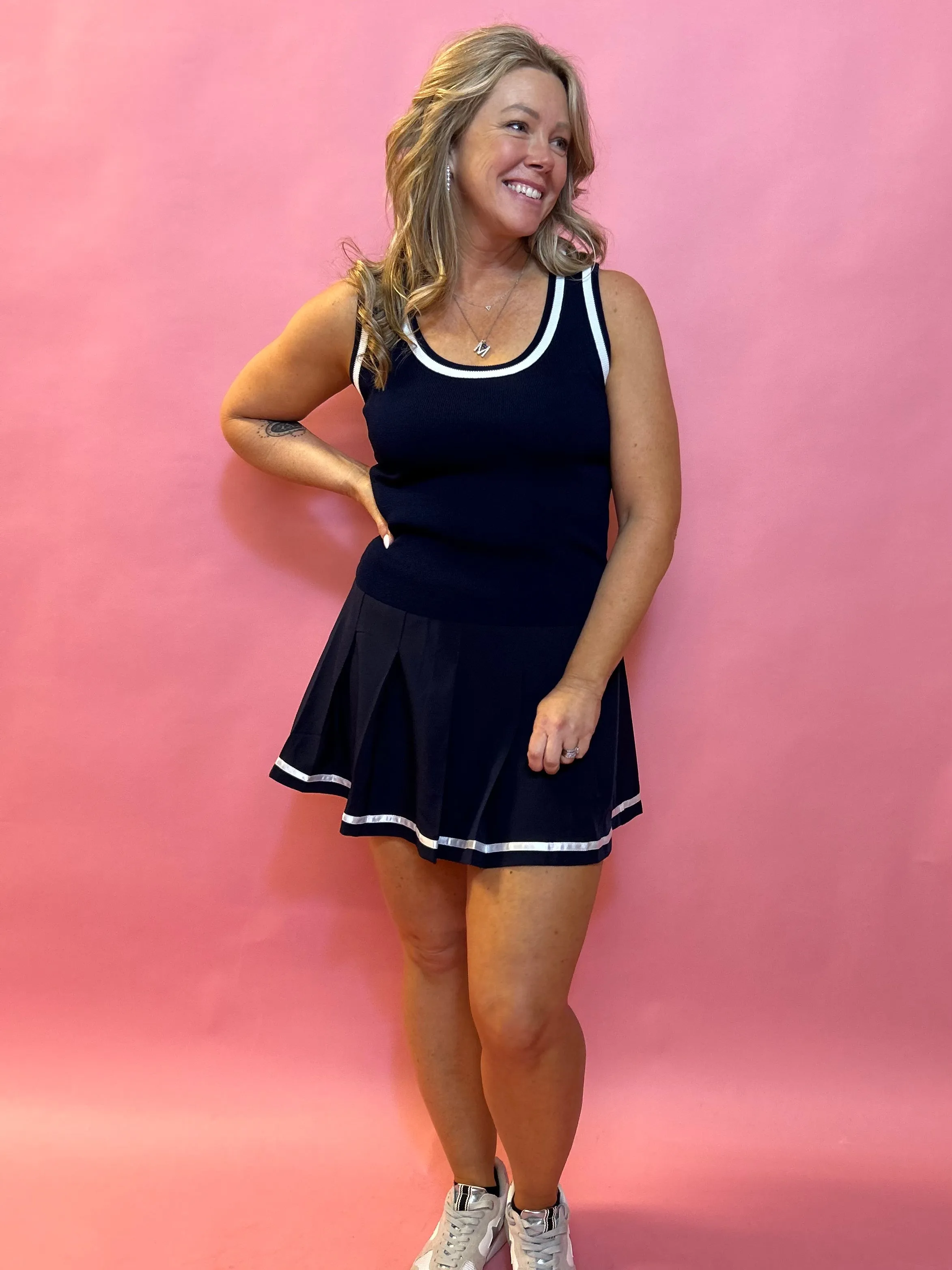 Sporty Elegance: Navy Pleated Skort with White Trim