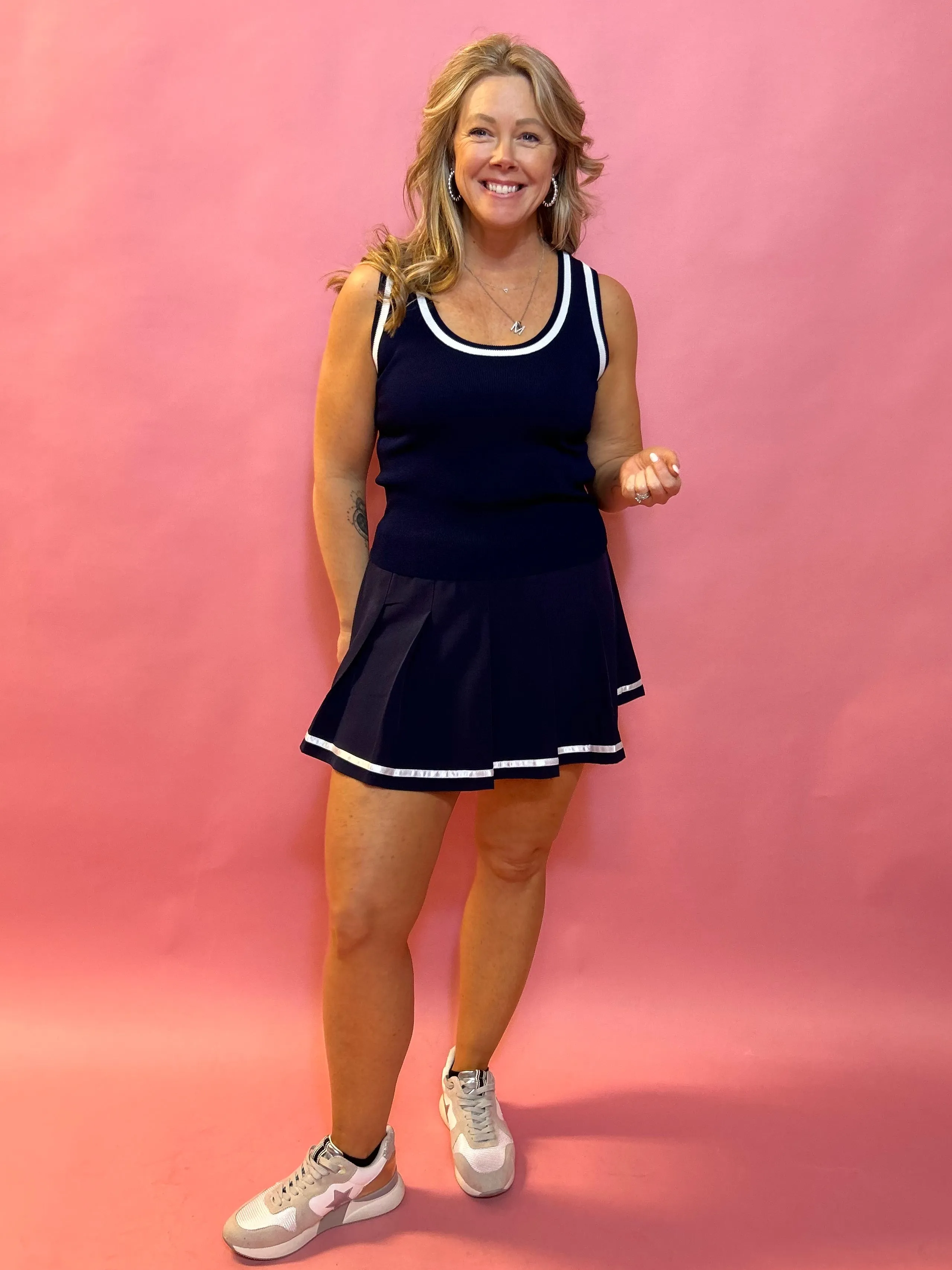 Sporty Elegance: Navy Pleated Skort with White Trim