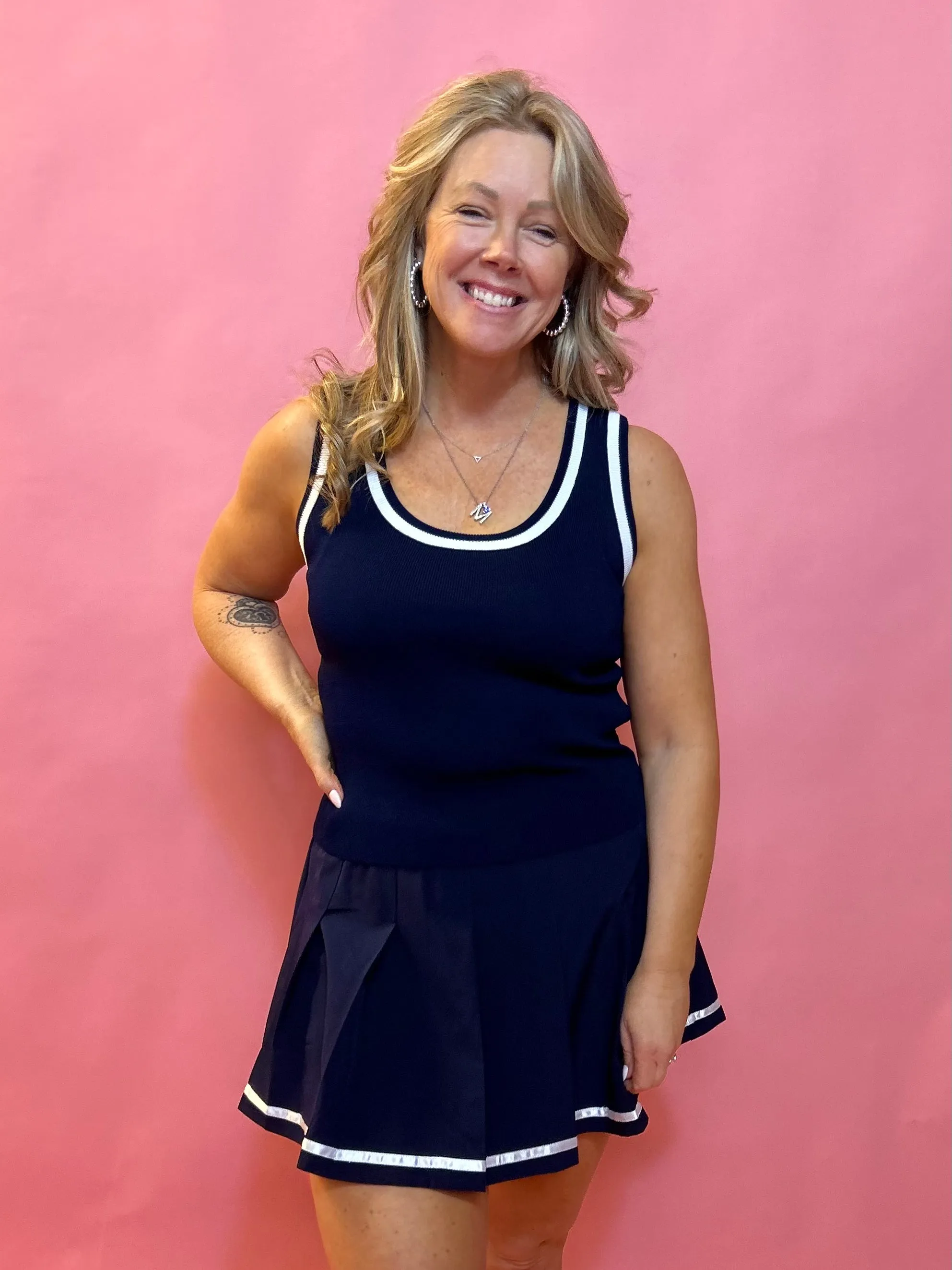 Sporty Elegance: Navy Pleated Skort with White Trim